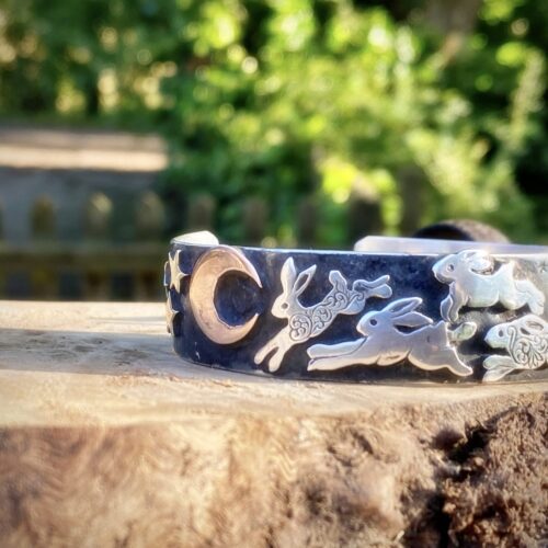 hand crafted and ethically created using recycled raw materials sourced from old unwanted uncollectible coins. Leaping magical bunny and rabbit jewelry