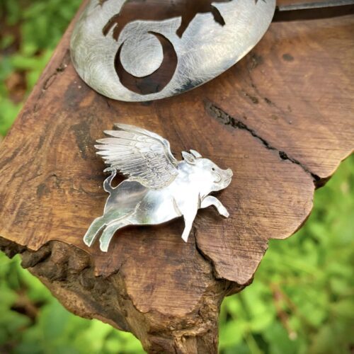 The Flying pig of disbelief. Handcrafted and ethically produced from a recycled vintage antique spoon