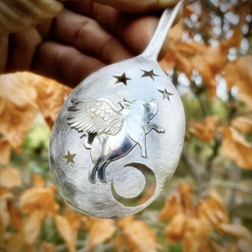 The Flying pig of disbelief. Handcrafted and ethically produced from a recycled silver spoon