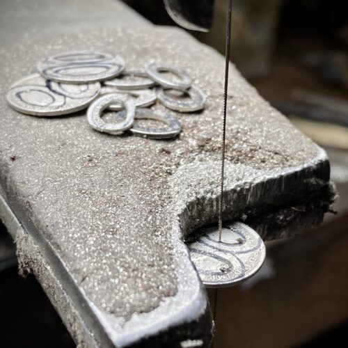 Personalised initials, hearts and stars bracelet individually handcrafted and recycled from an old Victorian silver coins and recycled ethical gold