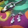 handcrafted and repurposed spoon flying elephant earrings