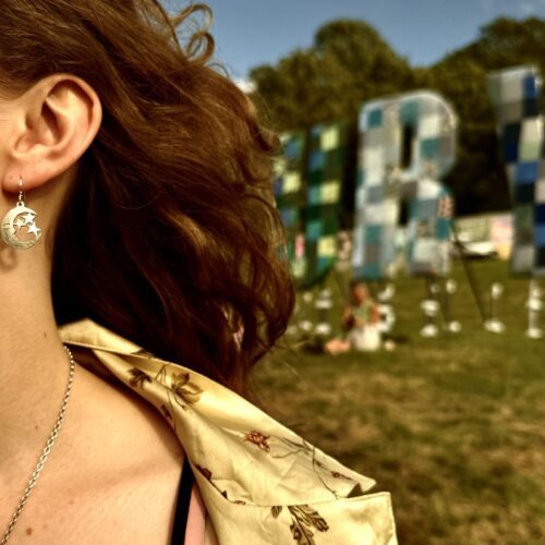ostara balance sun and moon earrings handcrafted in England using recycled ethical raw materials namely an old spoon
