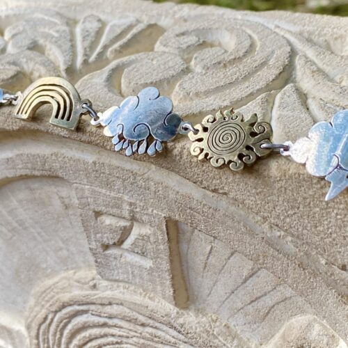 weather cloud sunshine bracelet handmade from up cycled silver coins and brass bronze coins