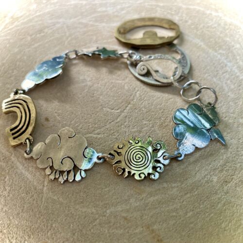 weather cloud sunshine bracelet handmade from up cycled silver coins