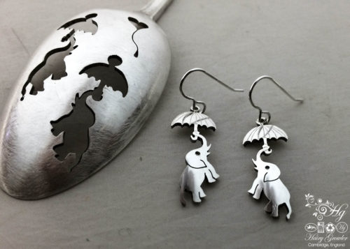 handcrafted and repurposed spoon flying elephant earrings