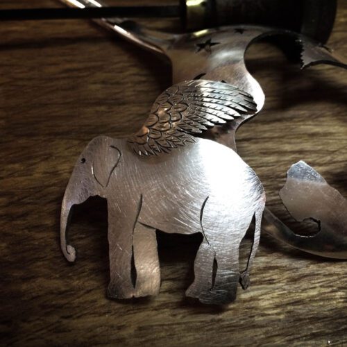 handcrafted and recycled spoon elephant brooch