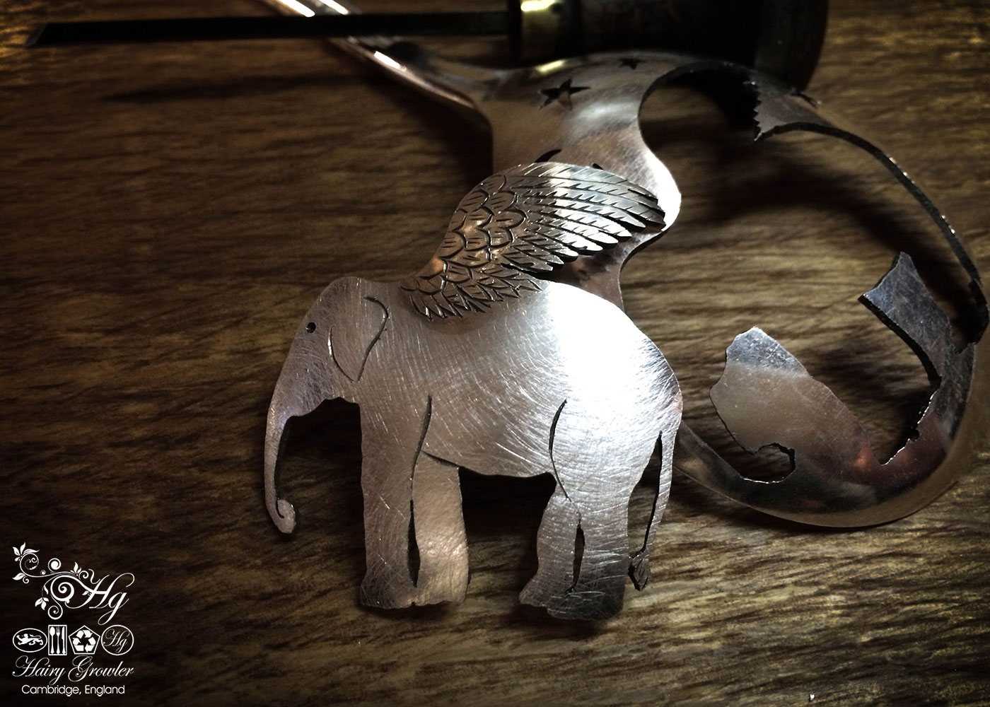 handcrafted and recycled spoon elephant brooch