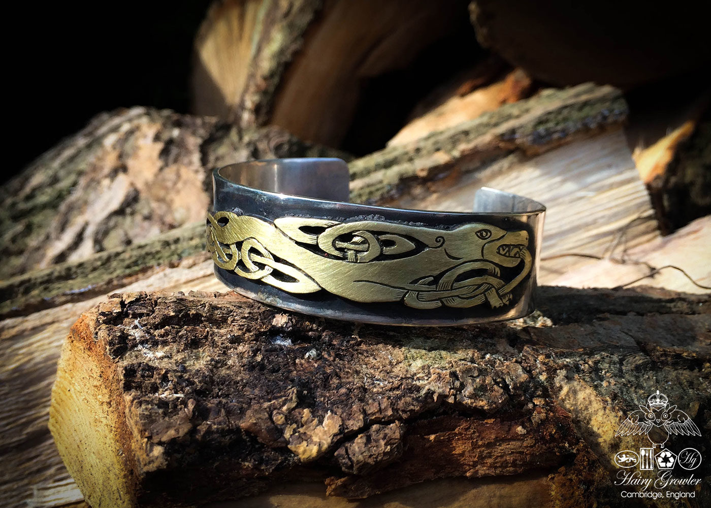Handcrafted and recycled silver and bronze celtic kuff bangle