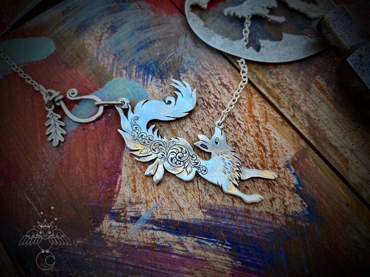 leaping and dancing vixen necklace made from silver coin