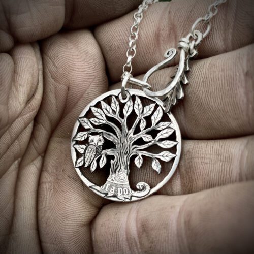 Handmade and upcycled coin owl in the tree pendant necklace
