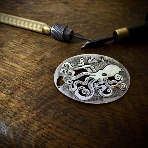 Handmade and upcycled, recycled silver coin kraken octopus necklace made in landlocked Cambridge, UK