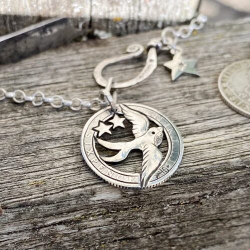 Handcrafted and repurposed silver sixpence coin birdsong swallow pendant necklace