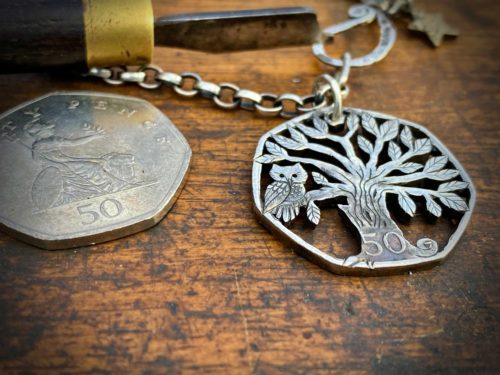 Handmade and upcycled coin owl in the tree pendant necklace