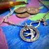 Handcrafted and repurposed silver sixpence coin birdsong swallow pendant necklace