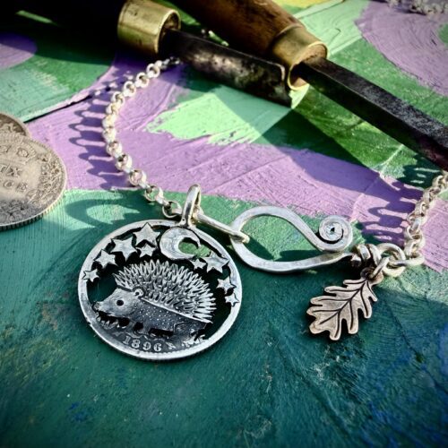 silver sixpence hedgehog necklace pendant handcrafted and ethical eco-conscious jewellery