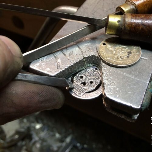 Handmade and upcycled silver sixpence coin day-of-the-dead skull necklace