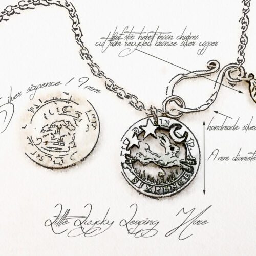 Handmade and upcycled silver sixpence coin leaping hare pendant necklace