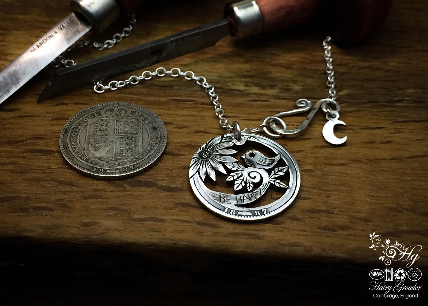 handmade and repurposed silver shilling coin bird necklace