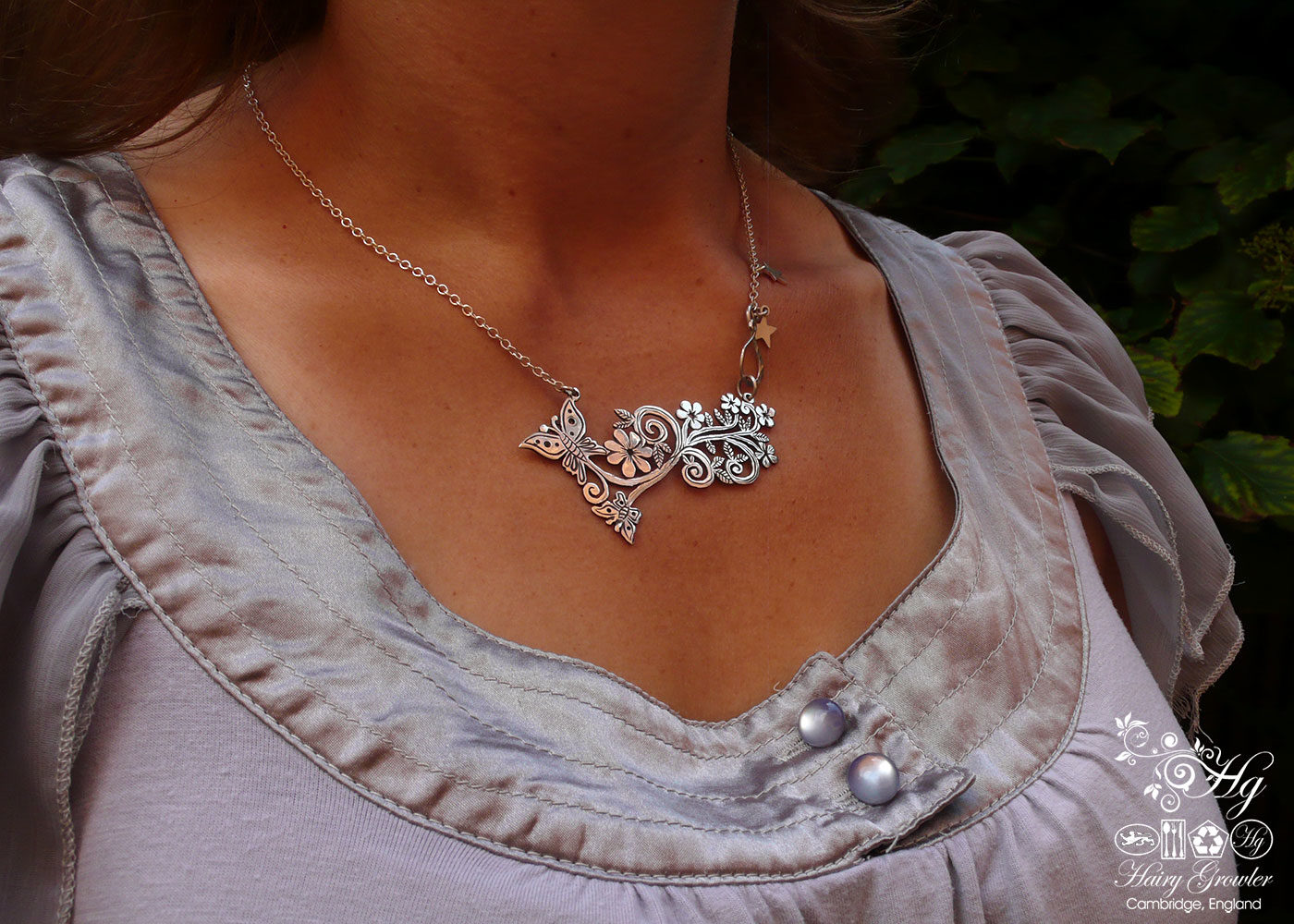 Handcrafted and recycled sterling silver crown coin butterfly necklace
