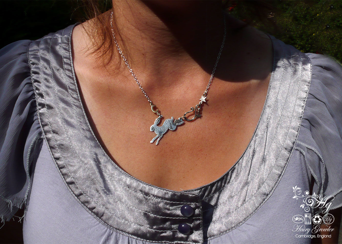 Handmade and upcycled sterling silver moon leaping hare necklace