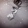 hand crafted and recycled sterling silver shillings and sixpence snowflakes and snow filled cloud