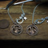 Hand cut halfpenny queen bird coin pendant necklace made in the Hg workshop