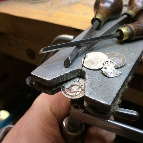 handcrafted and recycled silver threepence coin teeny weeny bird queen earrings