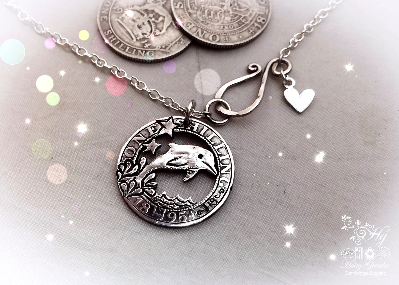 handmade and upcycled silver shilling dolphin necklace