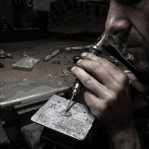 skull necklace handmade coin jewellery. Independent jeweller artisan studio creating ethical jewellery