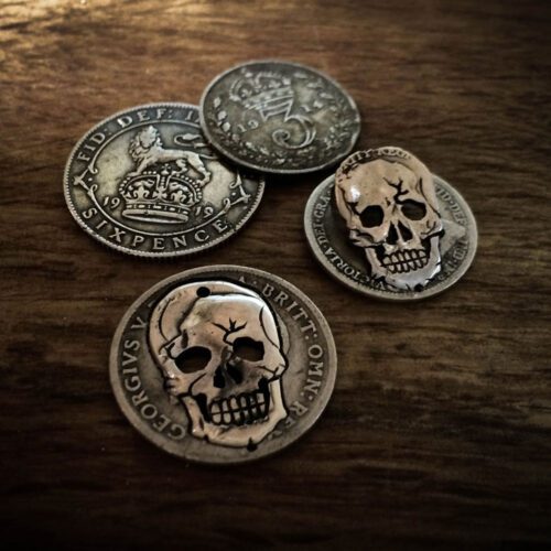 Handmade and upcycled silver sixpence coin skull necklace