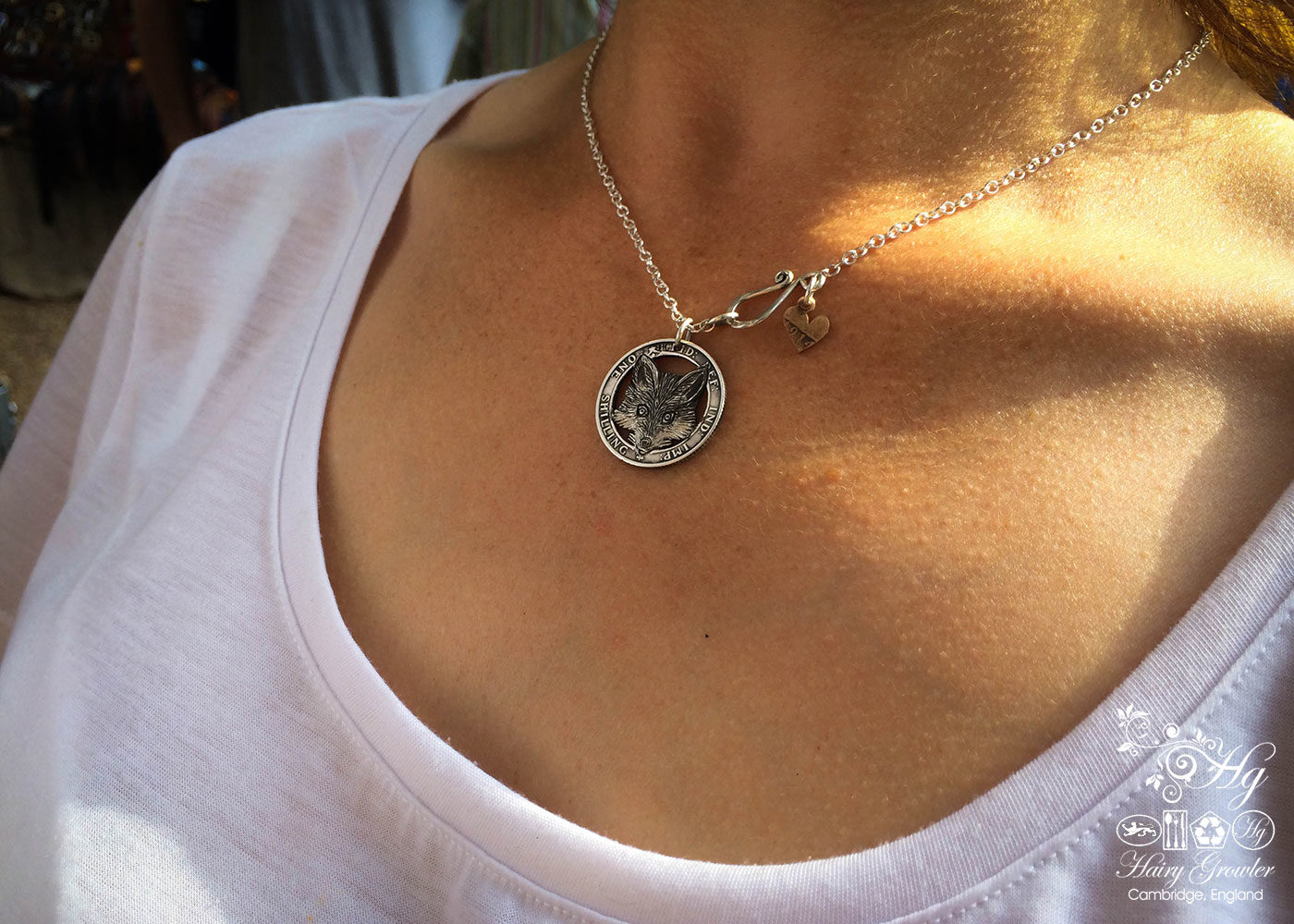 Handcrafted and recycled silver shilling The Silver Shilling collection. silver fox necklace totally handcrafted and recycled from old sterling silver shilling coins. Designed and created by Hairy Growler Jewellery, Cambridge, UK. necklace