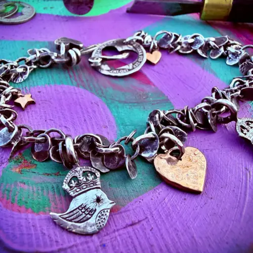 handcrafted teeny weeny Kingsy Queeny bird bracelet recycled silver threepence coins