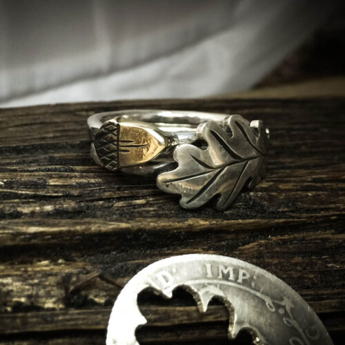 handcrafted and recycled bronze acorn and silver stacking rings