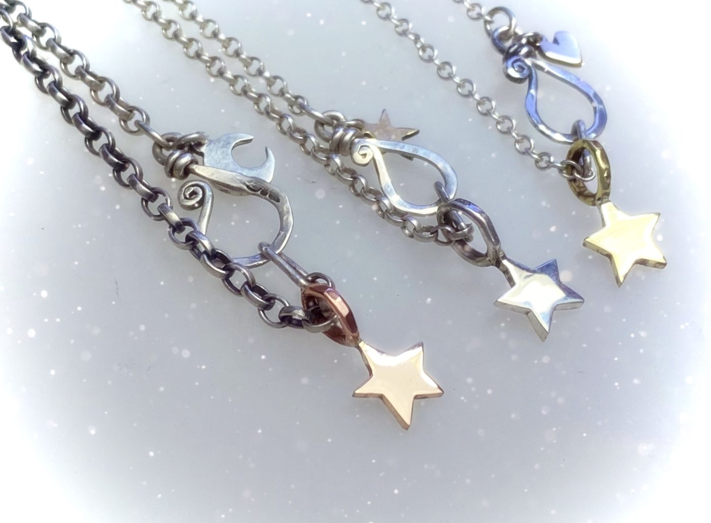 handcrafted and recycled silver star and moon charm for a tree sculpture, necklace or bracelet