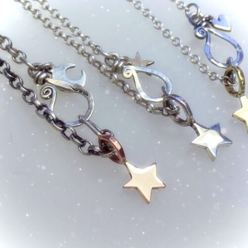 handcrafted and recycled silver star and moon charm for a tree sculpture, necklace or bracelet
