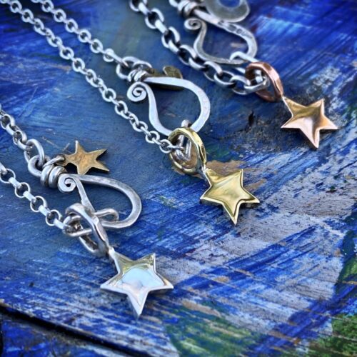 handcrafted and recycled silver star and moon charm for a tree sculpture, necklace or bracelet