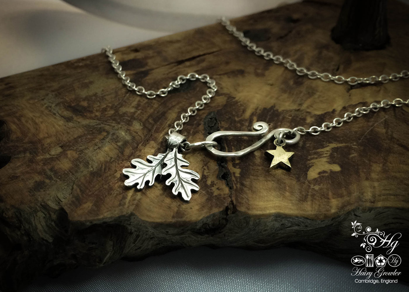 handcrafted silver pair of oak leaves charm for a tree sculpture, necklace or bracelet