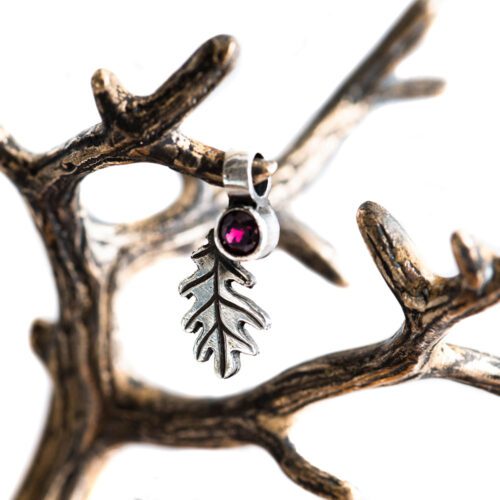 handcrafted silver and garnet oak leaf charm for a tree sculpture, necklace or bracelet
