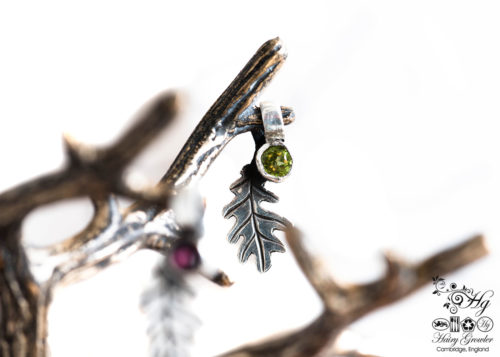 handcrafted silver and peridot and garnet oak leaf charm for a tree sculpture, necklace or bracelet