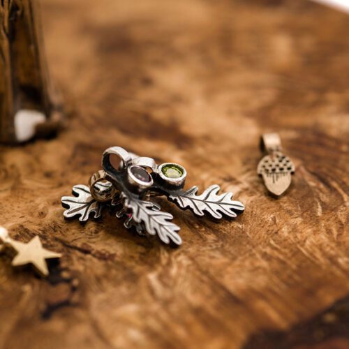 handcrafted silver and peridot and garnetoak leaf charm for a tree sculpture, necklace or bracelet