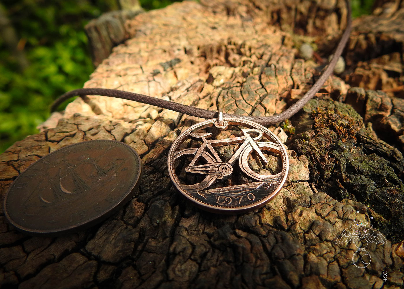 Handcrafted and recycled coin fixed speed bicycle pendant necklace.
