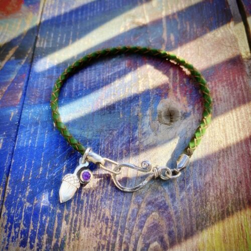 Silver and leather charm bracelet handcrafted and recycled for the tree of life sculpture collection