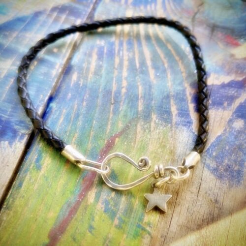 Silver and leather charm bracelet handcrafted and recycled for the tree of life sculpture collection