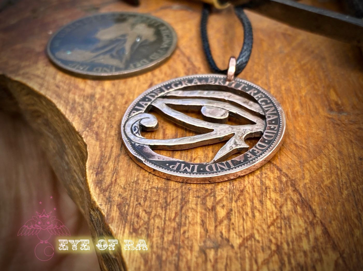 Handcrafted and repurposed coin eye of horus pendant necklace