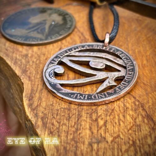 Handcrafted and repurposed coin eye of horus pendant necklace