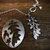 handcrafted and upcycled silver coin leafy branch necklace pendant