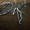Handmade and upcycled sterling silver bow and arrow True Love necklaces