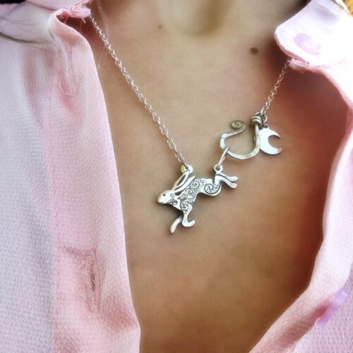 Leaping hare necklace handmade and recycled silver coin jewellery ethically handcrafted at an independant artisan studio workshop