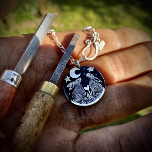 Moon gazing hares forged from fabulous 100 year old silver coins and star struck for eternity