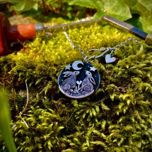 Moon gazing hares forged from fabulous 100 year old silver coins and star struck for eternity